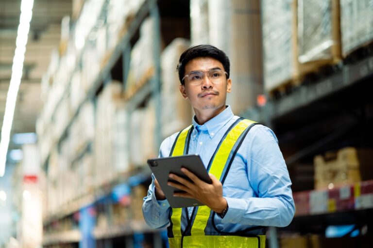 male warehouse manager with tablet minimizing warehouse shrinkage