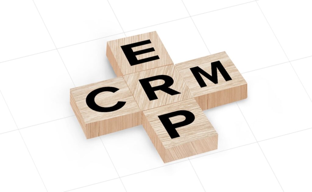 crm erp integration spelled in wooden blocks