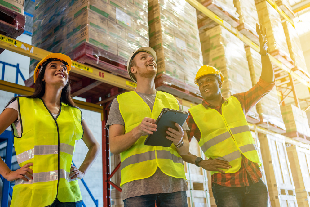fulfillment warehouse team wearing vests