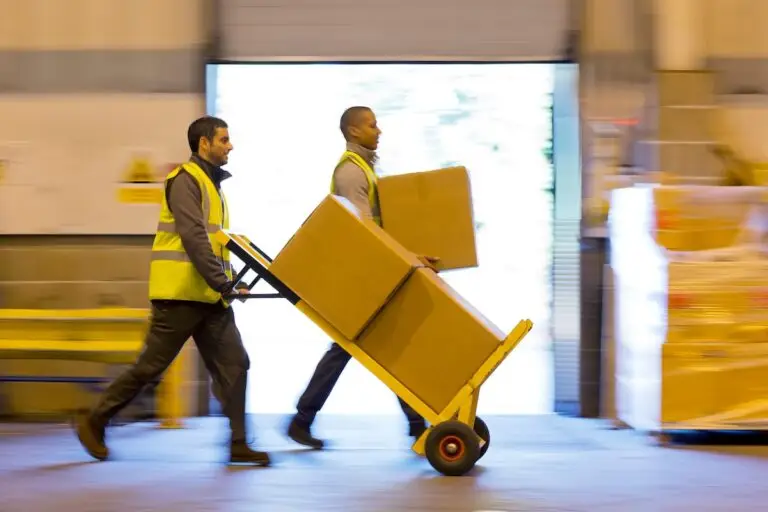 warehouse workers moving boxes